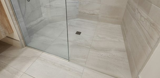 Tiled shower and bathroom floor