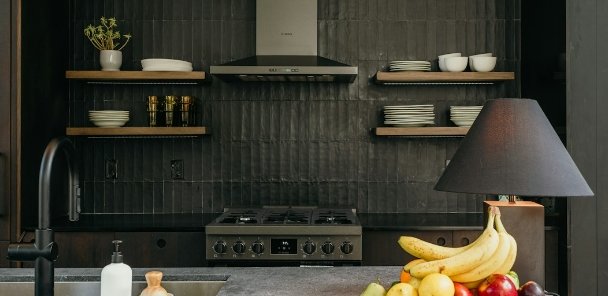 Kitchen with a tiled splashback